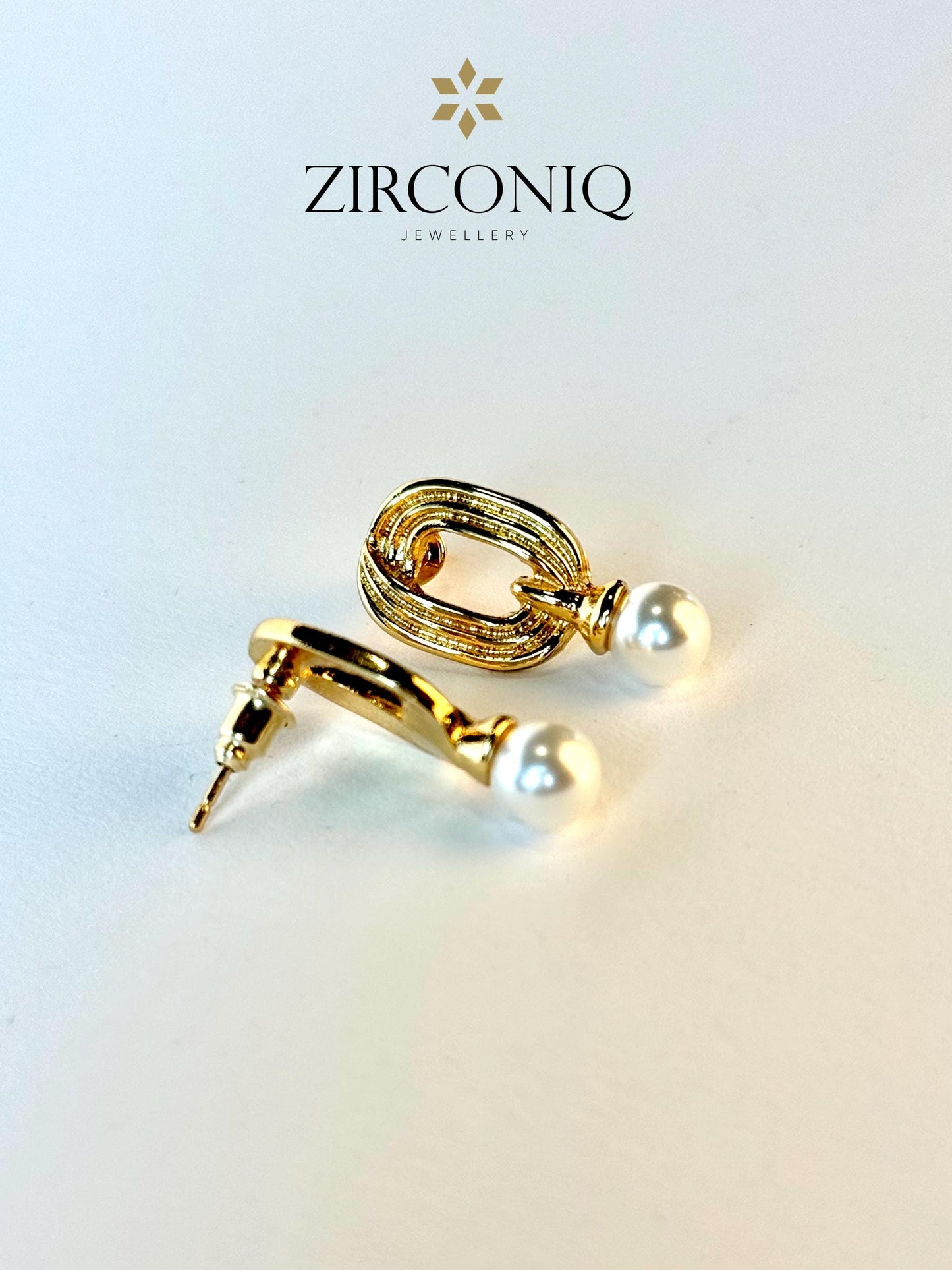 Gold Oval Drop Earrings