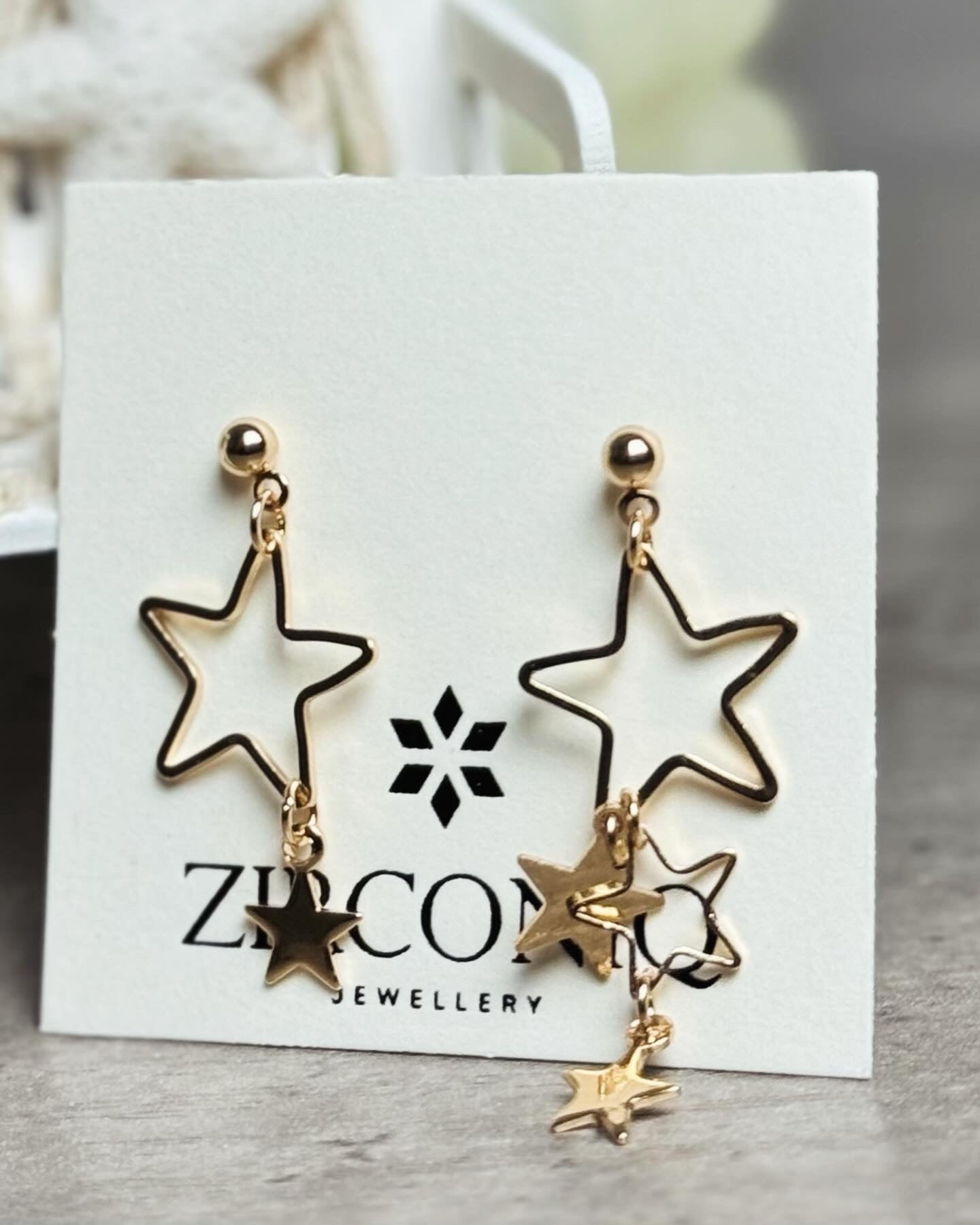 Gold Star Dangle Earrings