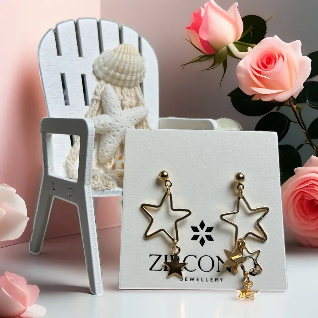 Gold Star Dangle Earrings