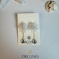 Elegant White Flower Dangle Earrings with Crystal Teardrop